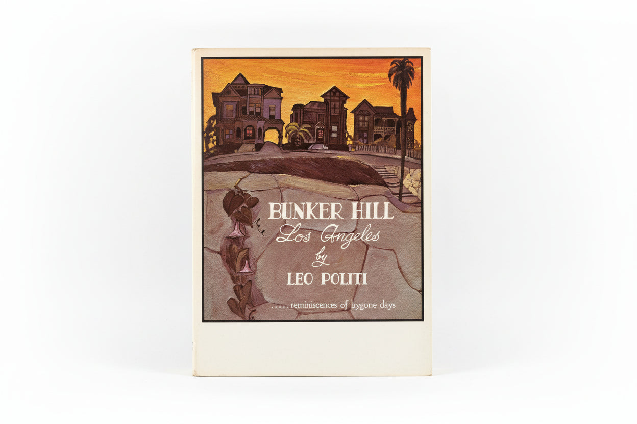 Book cover of 'Bunker Hill Los Angeles' by Leo Politi on a wooden surface.